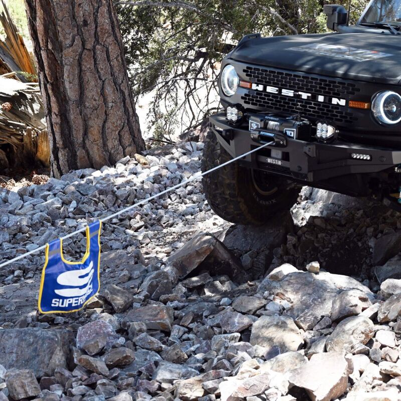 Angled view of Superwinch Scorpion 10000SR 10,000 lb winch featuring 3/8 inch synthetic rope and heavy-duty housing