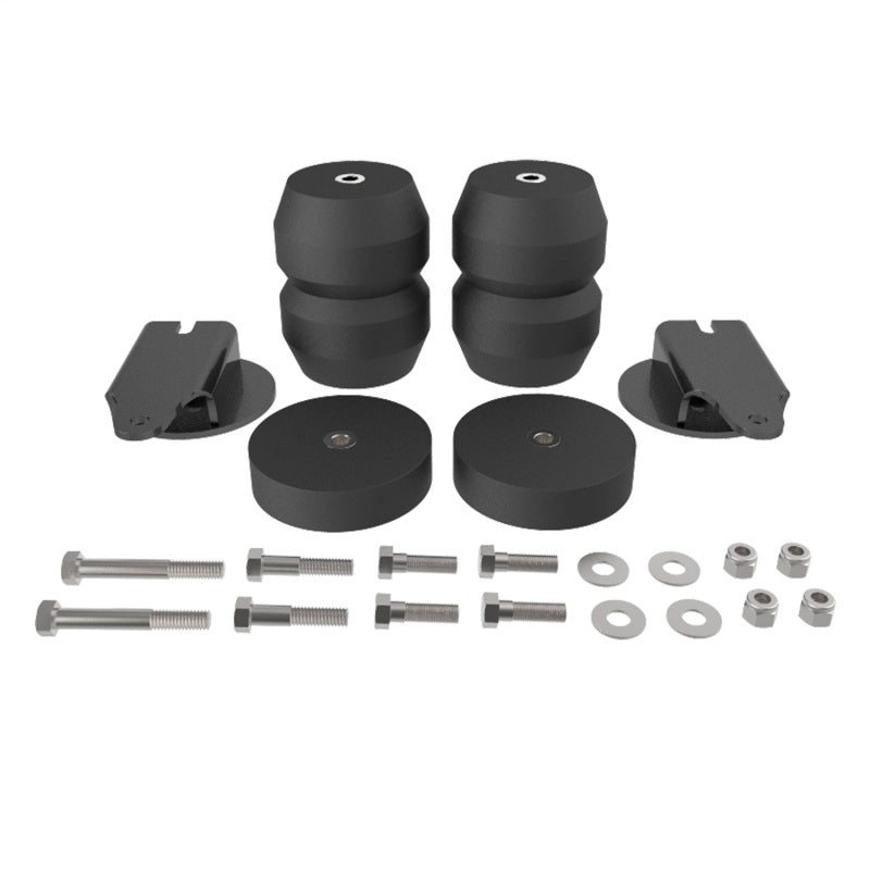 Timbren suspension enhancement kit components laid out: rubber bumpers, brackets, and mounting hardware