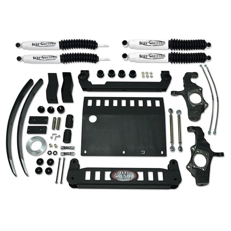 Tuff Country 4-inch lift kit components laid out: control arms, brackets, sway bar links, and hardware