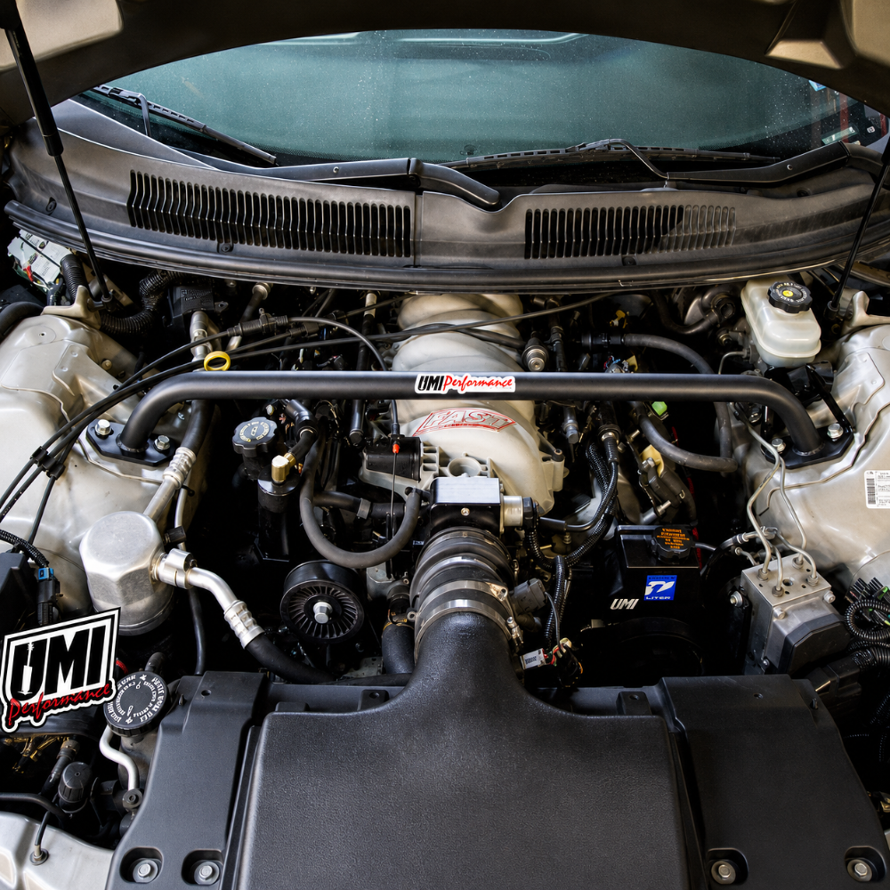 UMI 2005-B shock tower brace installed in a GM F-Body engine bay