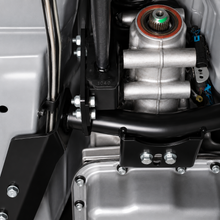 Load image into Gallery viewer, UMI 2261-B black crossmember and torque arm mount detail