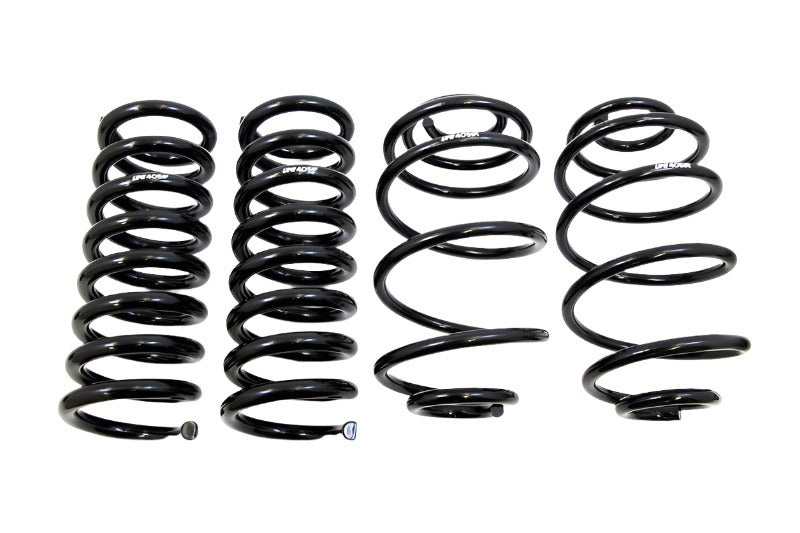 UMI 3051 complete front and rear 2 inch lowering spring kit for 1978-1988 GM G-Body, black powder coated 5160 and 9254 chrome silicon linear rate coils shown as a set.