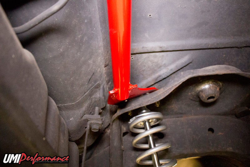 Second view of the bright red bolt-in rear shock tower brace.