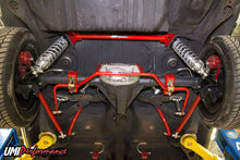 Load image into Gallery viewer, Close detail view of the bright red bolt-in rear shock tower brace.