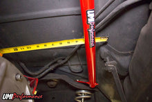 Load image into Gallery viewer, Angled view showing the profile of the bright red bolt-in rear shock tower brace.
