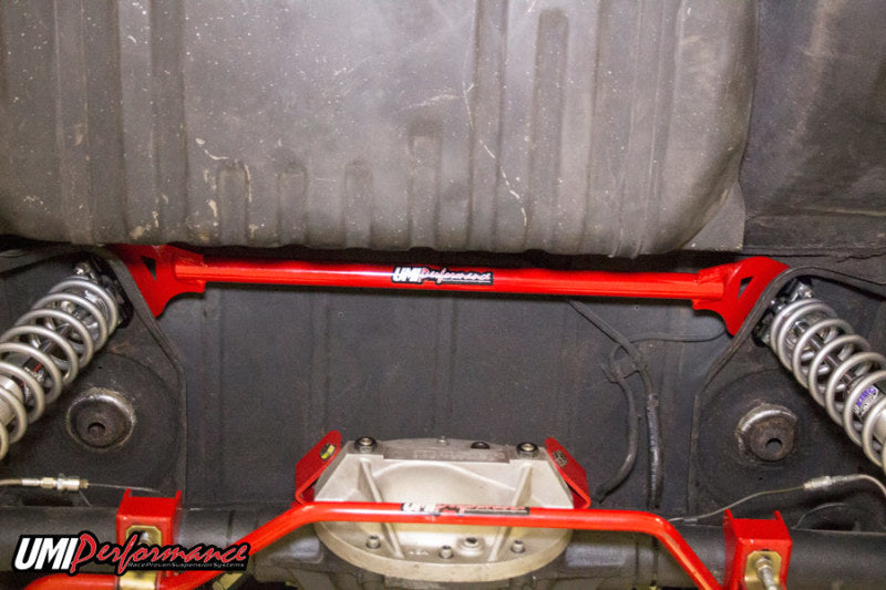 Further detail view of the bright red bolt-in rear shock tower brace.