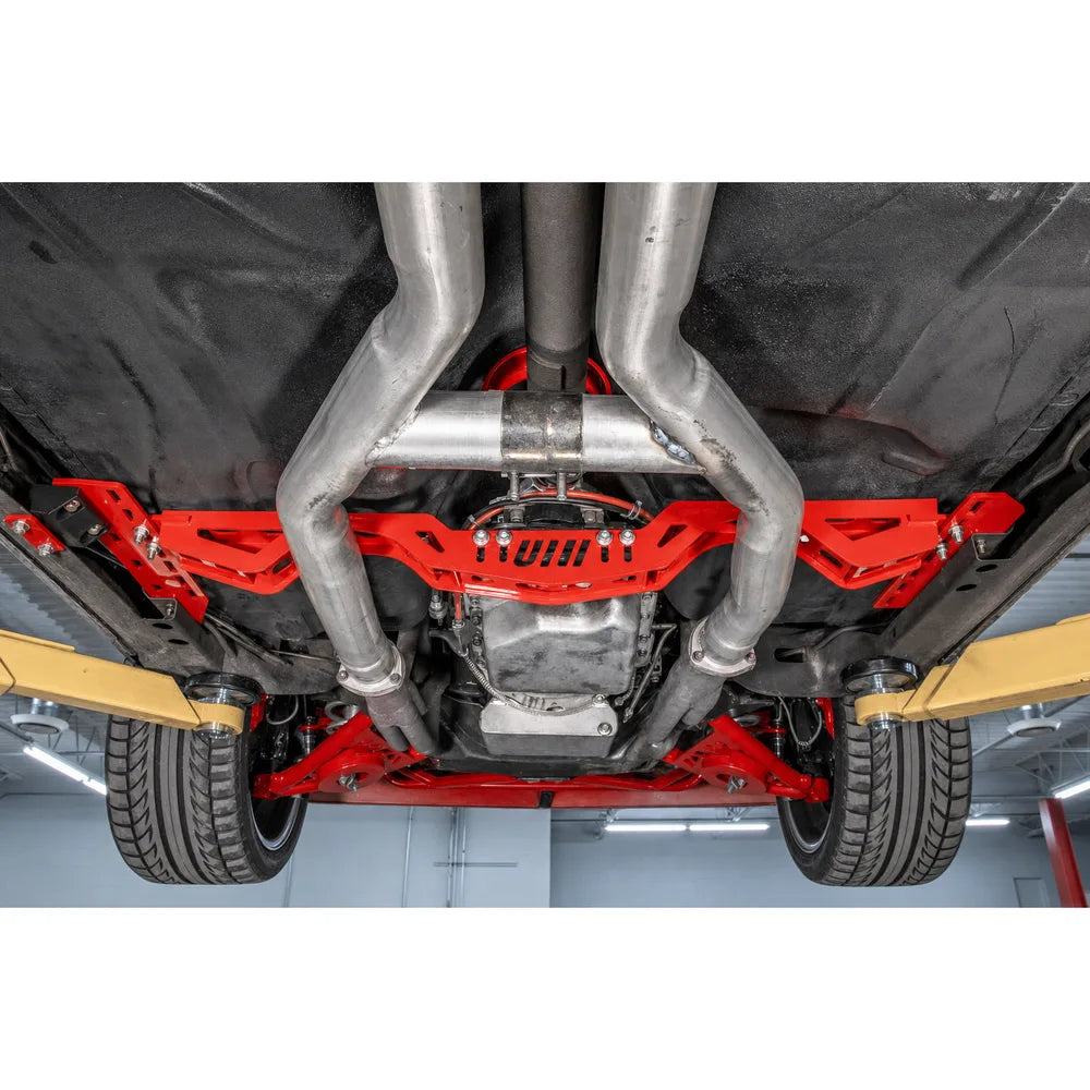 UMI Performance G-Body Transmission Crossmember on lift full underbody view