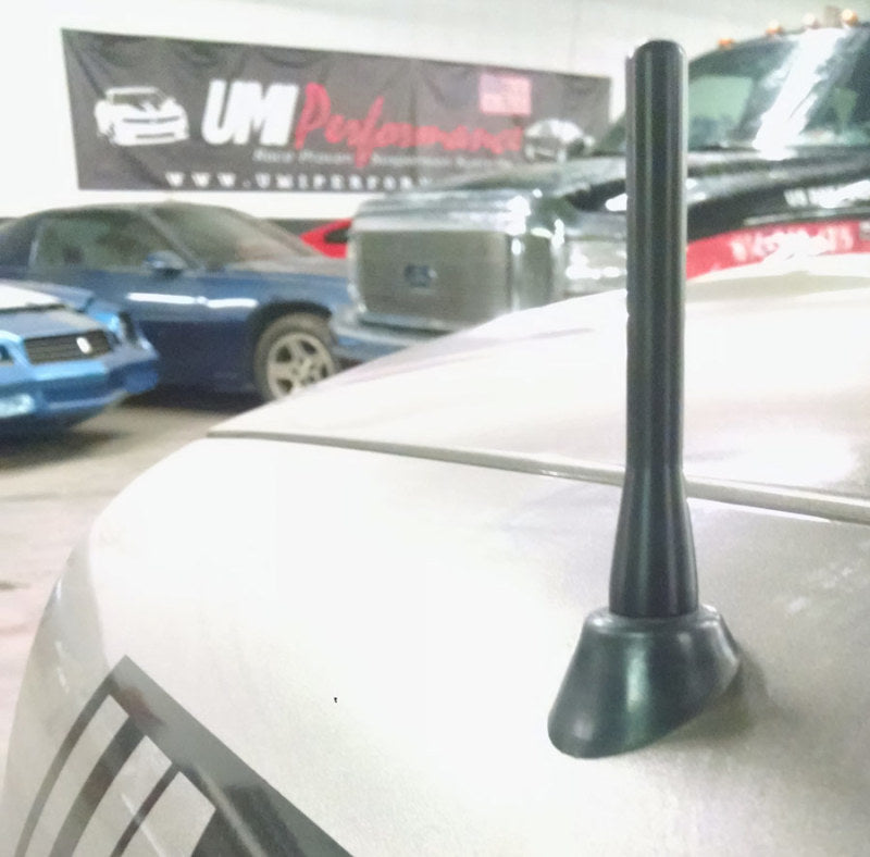 Threaded M6 x 1.0 male base of the black anodized UMI 2996 short antenna shown close up
