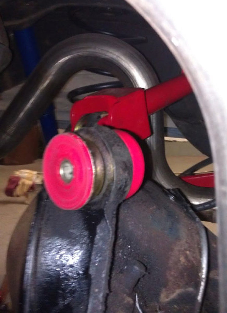 Black polyurethane thrust washer and stepped steel inner sleeve of the UMI 3000-B rear end housing bushing