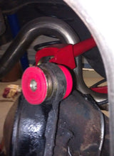 Load image into Gallery viewer, Red polyurethane thrust washer and stepped steel inner sleeve of the UMI 3000-R rear end housing bushing