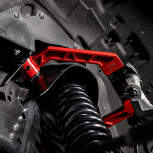Load image into Gallery viewer, UMI Performance black front control arms for Ford F-150 suspension alignment