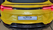 Load image into Gallery viewer, Side profile of Lamborghini Urus with carbon fiber Performante trunk wing upgrade