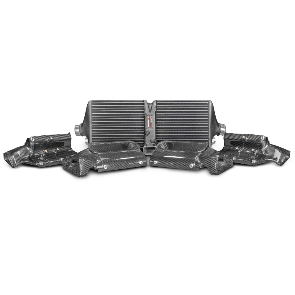 Wagner Tuning Competition intercooler kit with carbon air ducts for Porsche 992 Turbo on white background