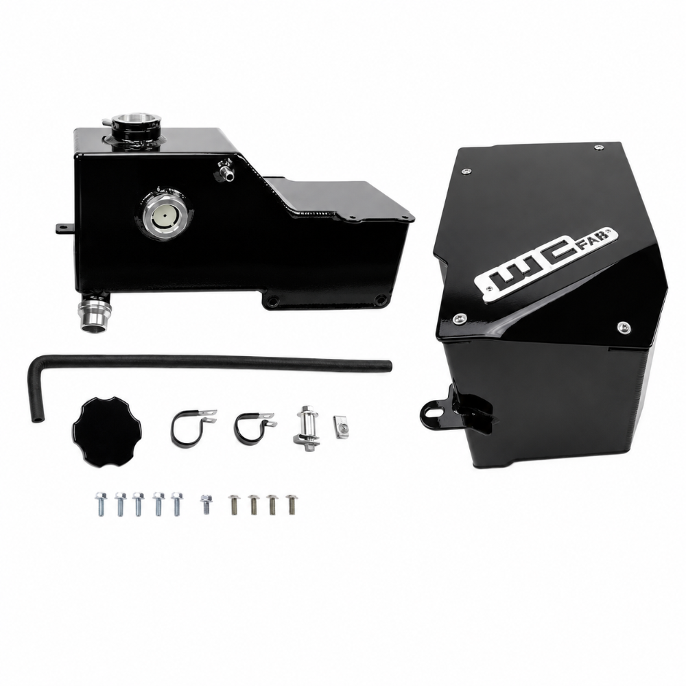 Gloss black Wehrli coolant tank and battery box kit shown fully assembled for the 6.7L Power Stroke engine bay.