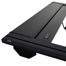 Load image into Gallery viewer, Westin Manual Retractable Tonneau Cover 24-26 Toyota Tacoma 6ft Bed Black - Westin 19-62795