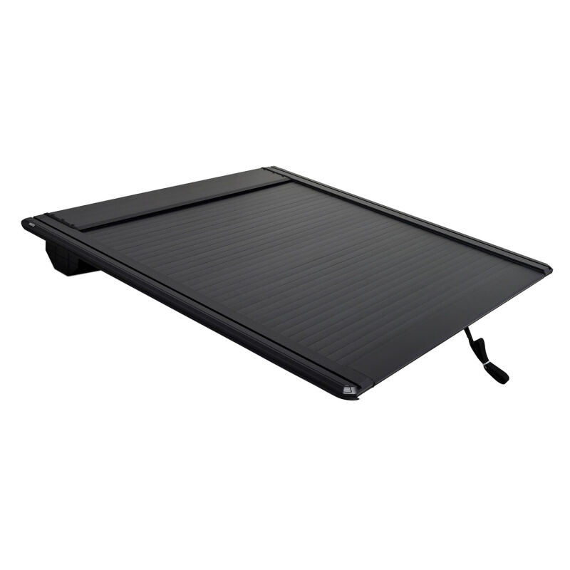 Westin manual retractable tonneau cover providing full truck bed access on a Ford F-150
