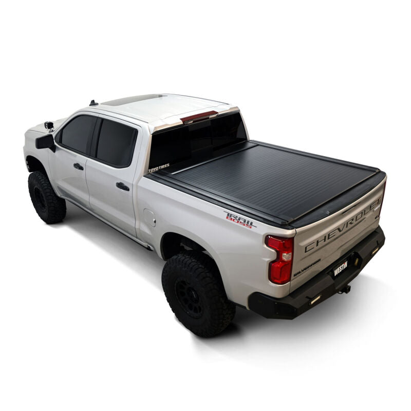 Side profile of the Westin manual retractable tonneau cover on a 2019-2026 Chevrolet Silverado 1500