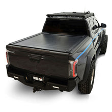Load image into Gallery viewer, Black powder-coated aluminum slats on the Westin manual retractable tonneau cover