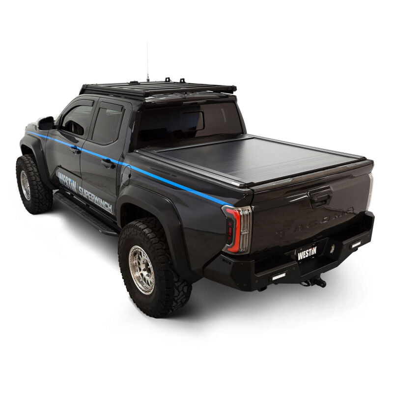 Rear view of the Westin manual retractable tonneau cover for a 2024-2026 Toyota Tacoma