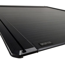 Load image into Gallery viewer, Westin Electric Retractable Tonneau Cover 19-26 Ram 1500 New Body 6.4ft Bed Black close-up view (7)