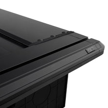 Load image into Gallery viewer, Westin Electric Retractable Tonneau Cover 19-26 Ram 1500 New Body 6.4ft Bed Black close-up view (1)