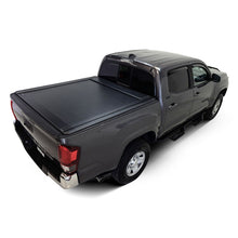 Load image into Gallery viewer, Westin 16-23 Toyota Tacoma 5ft 5in Bed Manual Retractable Tonneau Cover - Black - Westin 19-61065