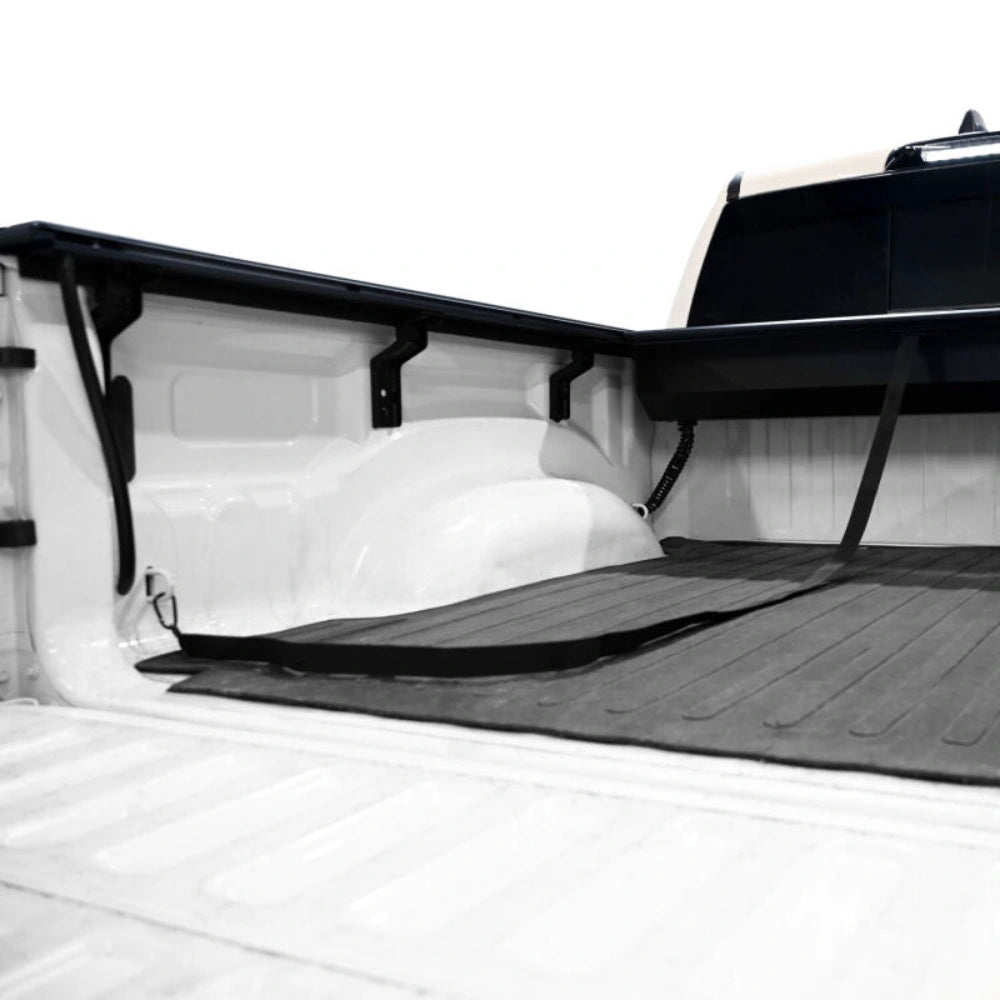 Rear angle view of a Westin retractable tonneau cover installed on a Ram 1500