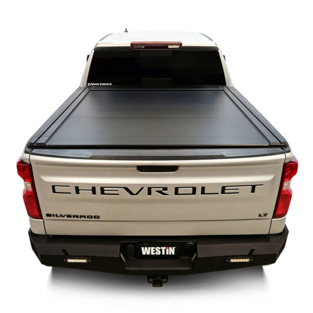 Westin manual retractable tonneau cover installed on a 2019-2026 Chevrolet Silverado 1500