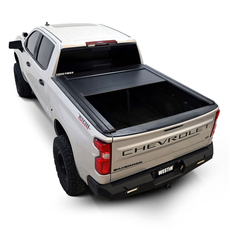 Compact roll-up canister on the Westin WES19-64745 manual retractable tonneau cover