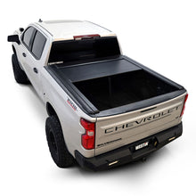 Load image into Gallery viewer, Compact roll-up canister on the Westin WES19-64745 manual retractable tonneau cover