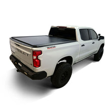Load image into Gallery viewer, Westin WES19-64745 manual retractable tonneau cover shown in the open position on a Chevrolet Silverado 1500
