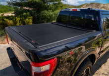 Load image into Gallery viewer, Roll-N-Lock 15-18 Ford F-150 SB 77-3/8in M-Series Retractable Tonneau Cover Roll-N-Lock