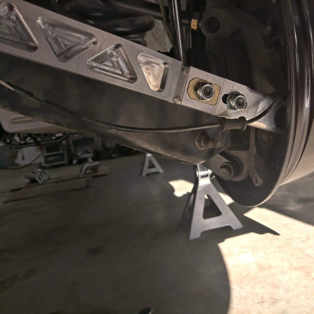 AAD Performance C014-0000 adjustable billet rear toe arms, wheel clearance view, image 5 of 7