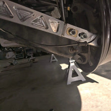Load image into Gallery viewer, AAD Performance C014-0000 adjustable billet rear toe arms, wheel clearance view, image 5 of 7