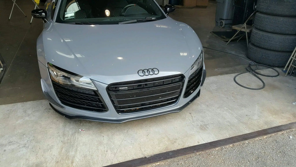Light blue 2007-2015 Audi R8 in a shop with the German Rush carbon fiber front splitter installed