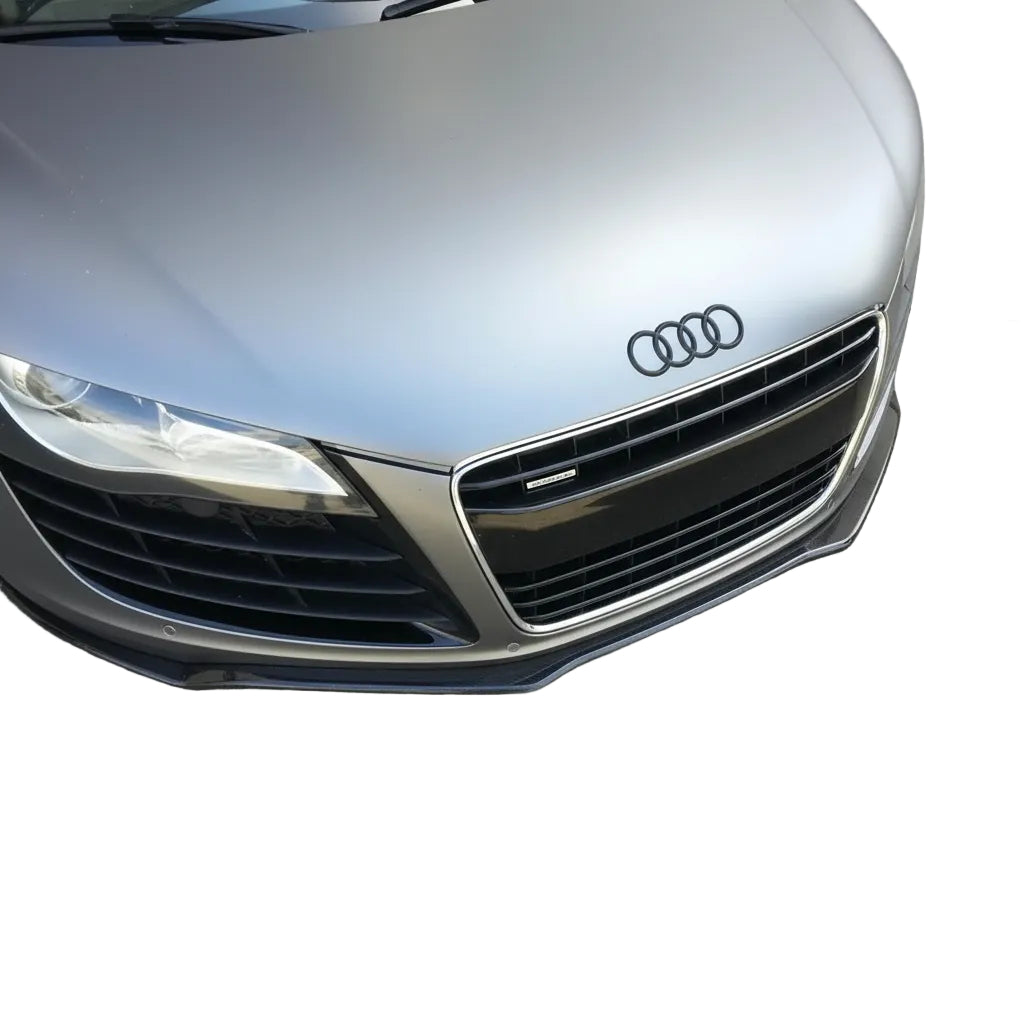 Gloss 2x2 carbon fiber front splitter fitted to the lower bumper of a silver 2007-2015 Audi R8