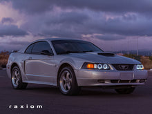Load image into Gallery viewer, Raxiom 99-04 Ford Mustang Dual LED Halo Projector Headlights- Black Housing (Smoked Lens) - Raxiom 49113