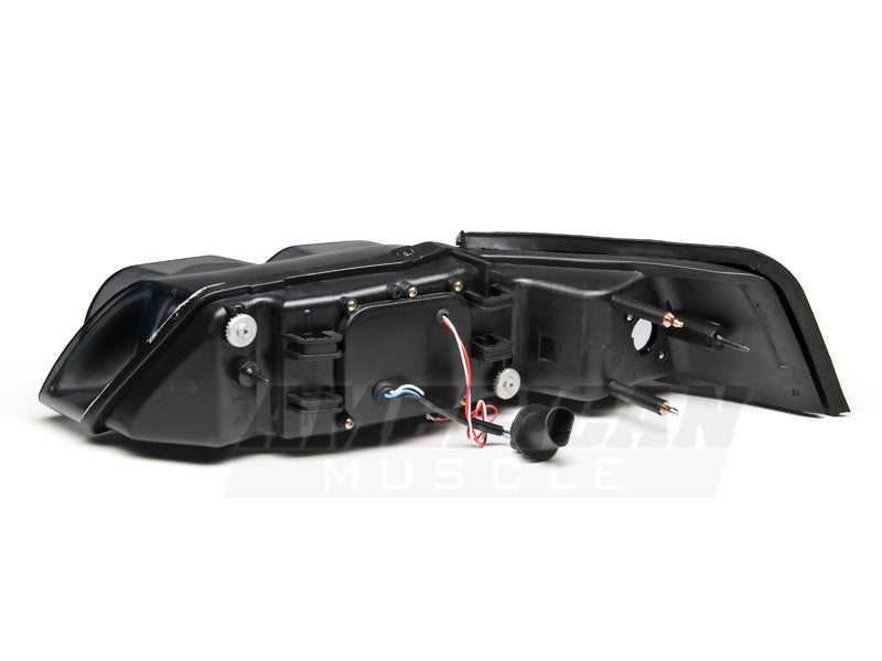 Raxiom 99-04 Ford Mustang Dual LED Halo Projector Headlights- Black Housing (Smoked Lens) - Raxiom 49113